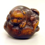 Netsuke of a Dog (image from Wikicommons)