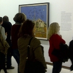 Miro Exhibition Visitors admiring Miro's painting, The Farm, which Hemingway scraped together 5000 Francs to purchase